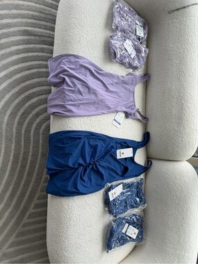 Lavender and navy activewear one piece.  6 pieces whole sale